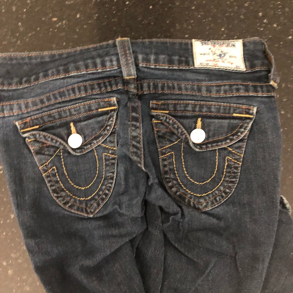 TRUE RELIGION JEANS.